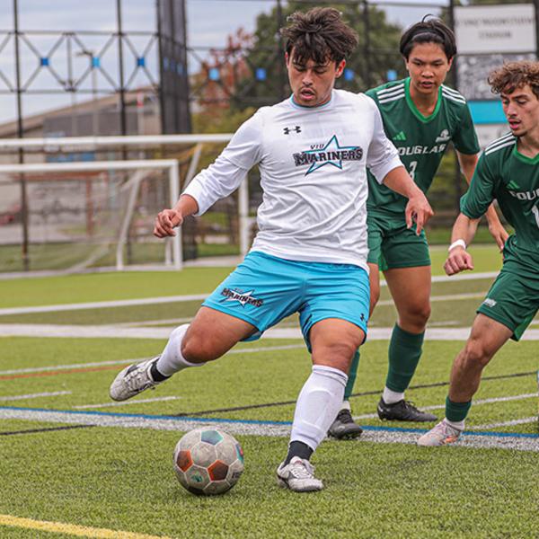 michael kicks the ball