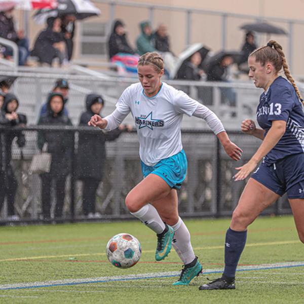 tori runs down the field with the ball