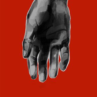 A hand pointing downward on a red background.