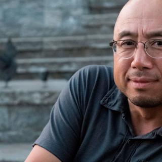 Jack sits on stairs, leans his head on his hand