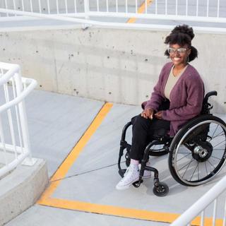 woman in a wheelchair on a ramp at VIU's Nanaimo campus