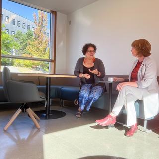 Sheila Malcolmson, MLA for Nanaimo, and Lillian Morton tour the Shq’apthut Elder lounge