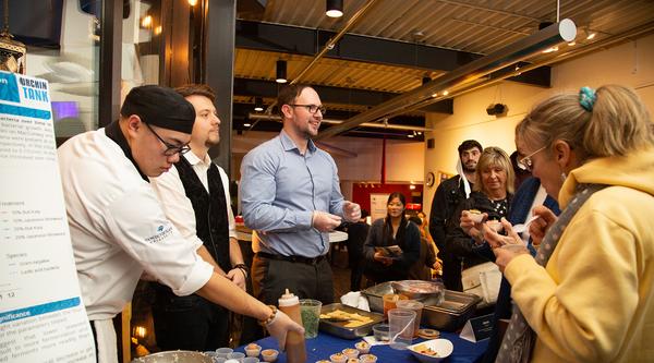 Culinary arts students serve their seaweed creations to attendees during Urchin Tank, 2022.