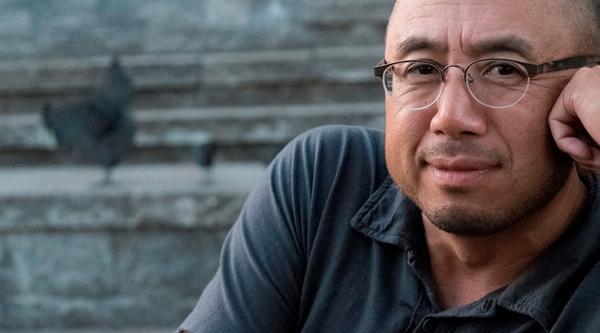 Jack sits on stairs, leans his head on his hand