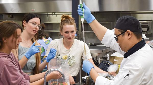 Four VIU microbiology and culinary arts work on their fermented seaweed products.