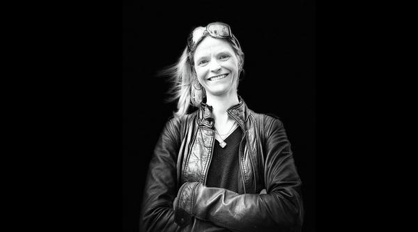 Dr. Jennifer Griffiths smiles while crossing her arms.