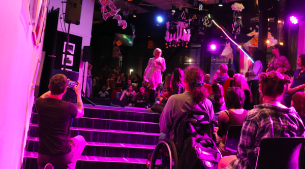 A performer on the stage during Drag in the Theatre.