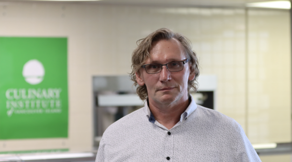 Tim May looking at the camera