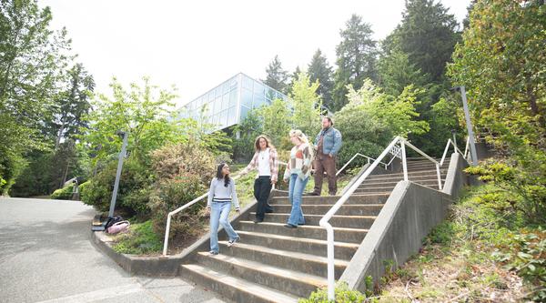 students walking down a set of stairs outside