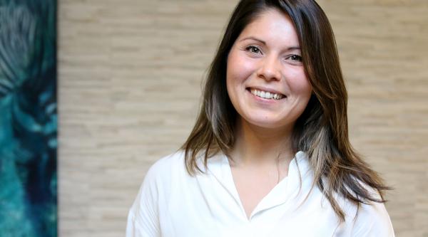 Photo of VIU alumna Megan Yim smiling at the camera