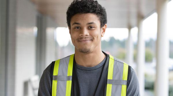 Mike de Vries portrait photo wearing an electrical vest
