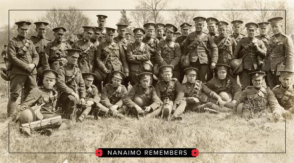A group of soldiers pose for a photo with Nanaimo Remembers written across the bottom