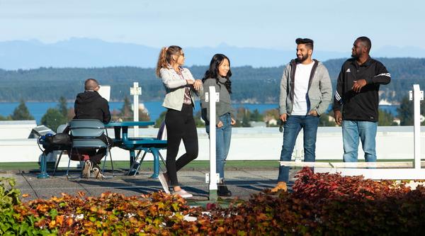 Students chatting on the roof of Building 300, VIU Nanaimo campus