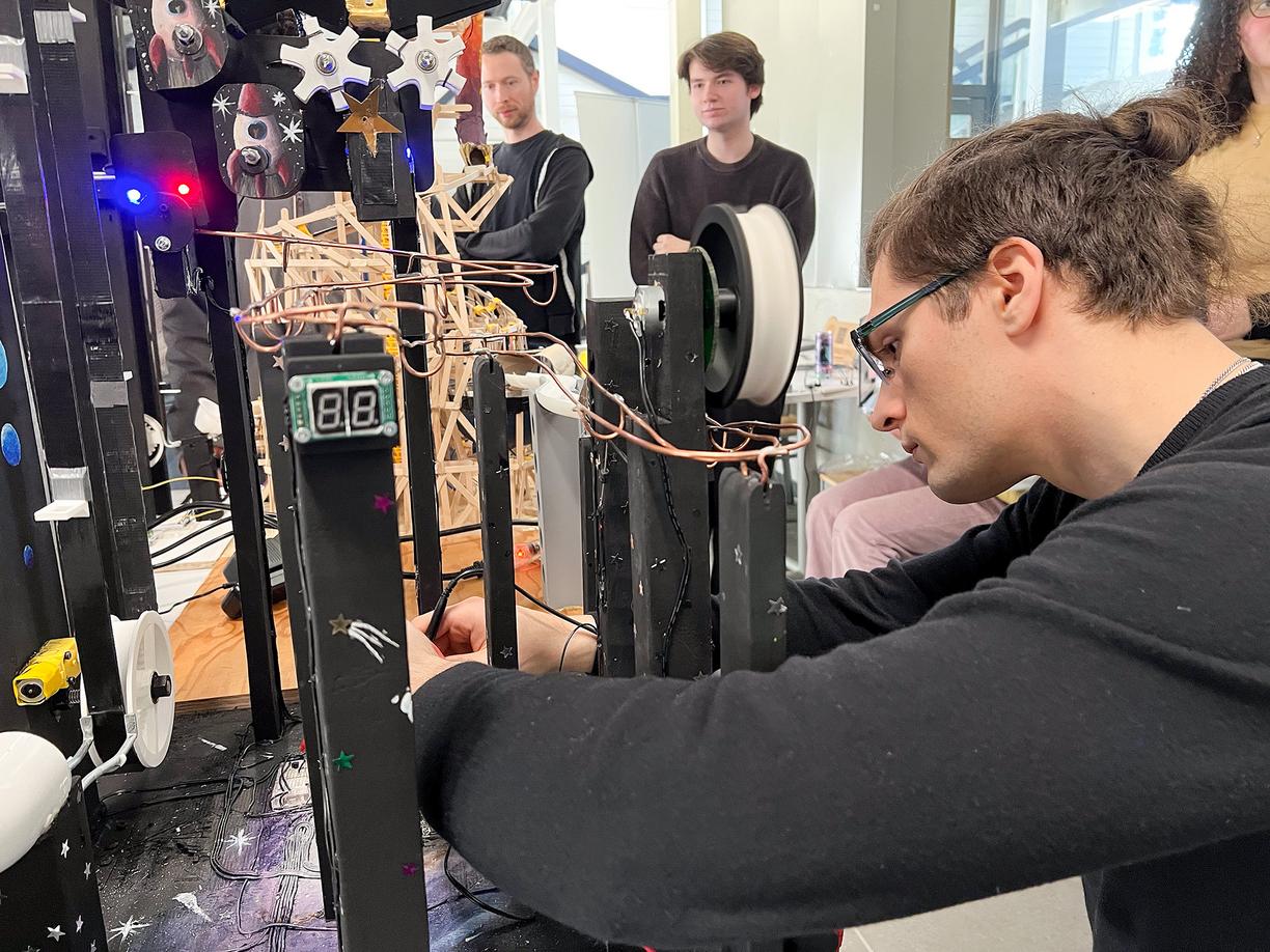 Engineering students adjust their designs