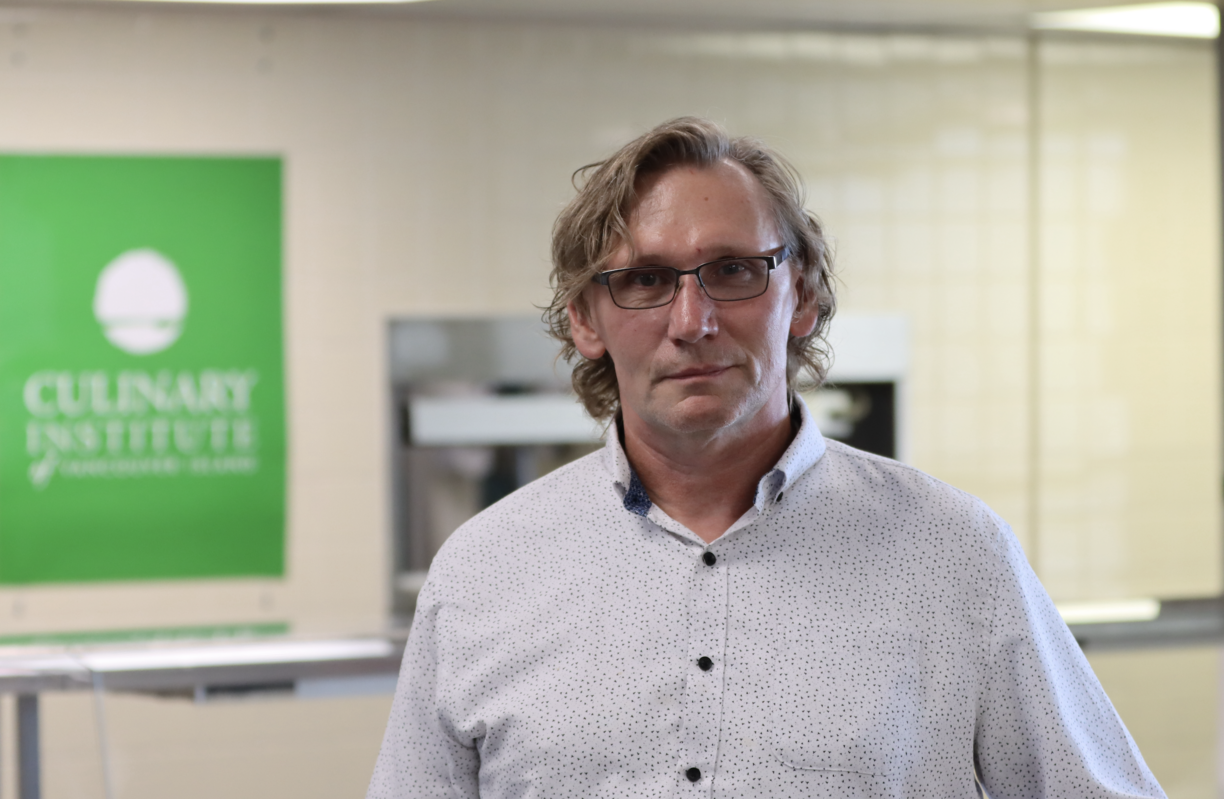 Tim May looking at the camera