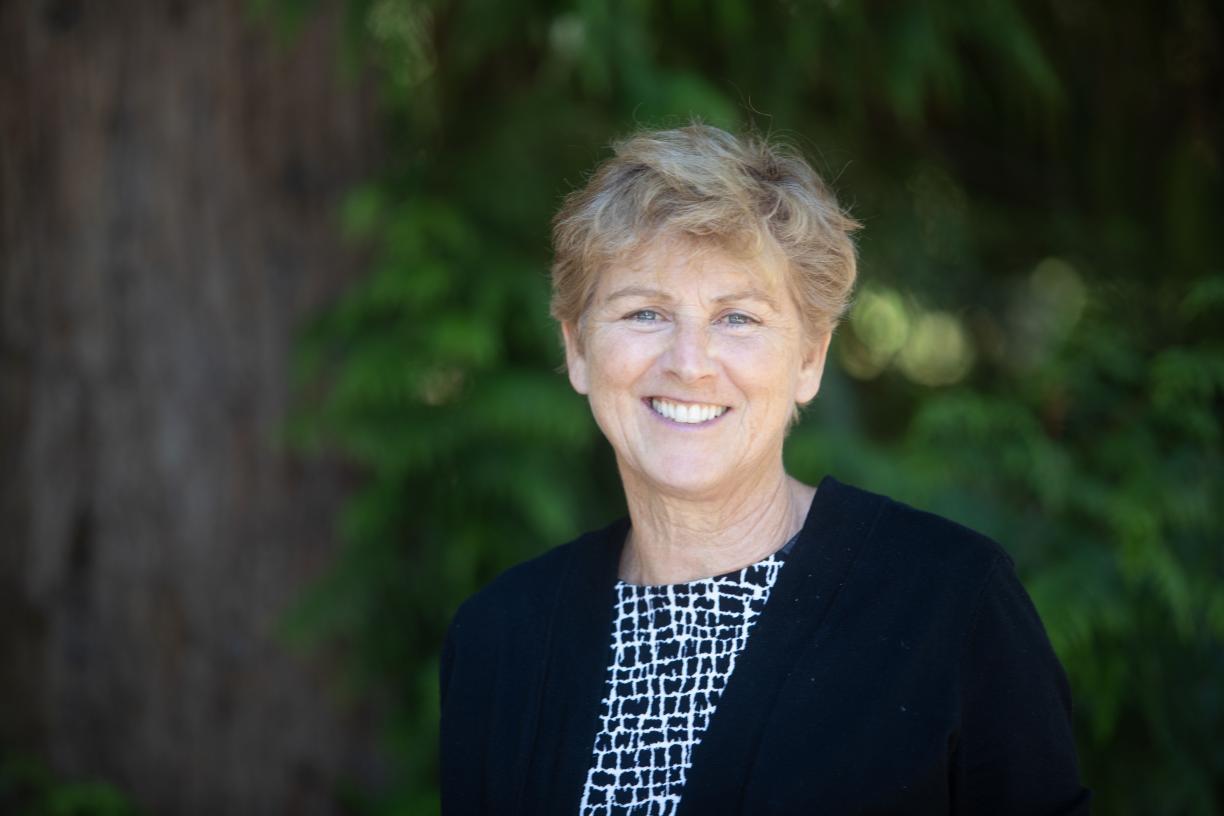 Claire portrait with a green background