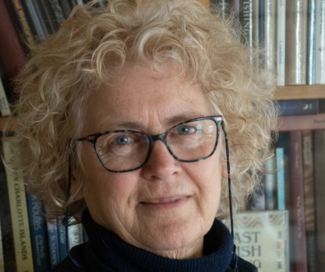 Liz smiling at the camera